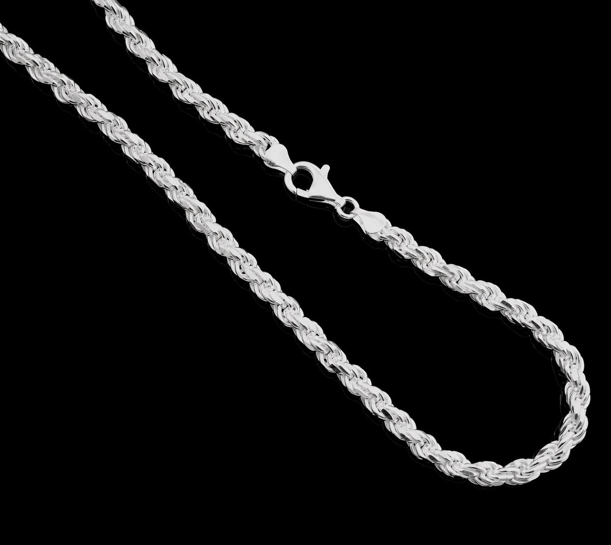 A silver rope chain necklace with a lobster clasp, displayed on a solid black background.